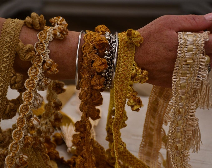 Gold, beige, ivory onions of precious trimmings