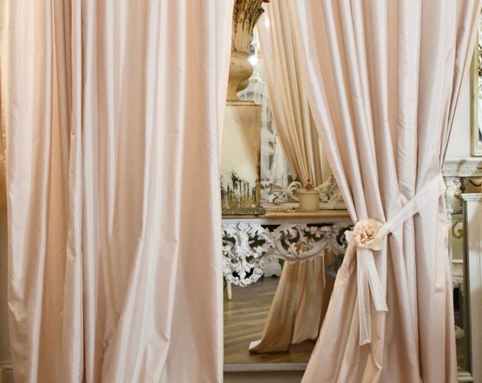 Pair of delicate pink chiffon curtains