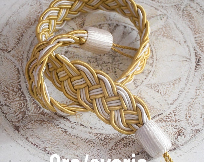 Pair of two-tone braided curtain bracelets