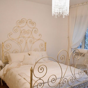Art Nouveau style wrought iron bed in antique ivory