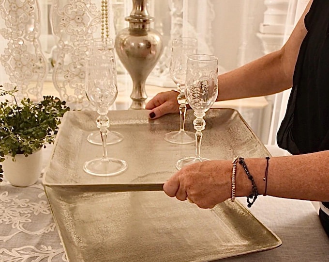 Wonderful pair of silver leaf trays