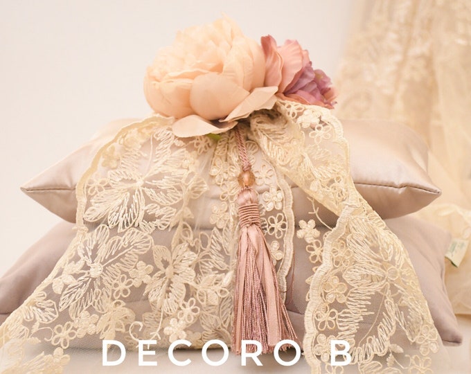 Cushions, flowers, silk, velvet, pearls, lace and .... perfume