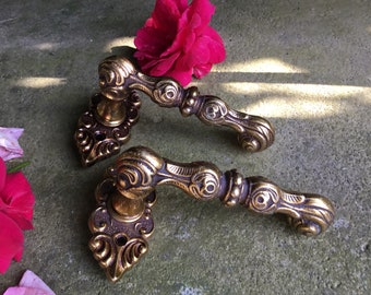 Baroque handle in solid brass vintage