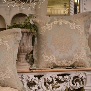 “Royal Style” Collection, Luxury cushion in light blue satin and fine lace, medallion decoration
