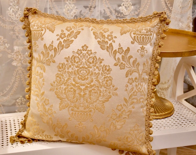 Gold damask cushion and fine trimmings
