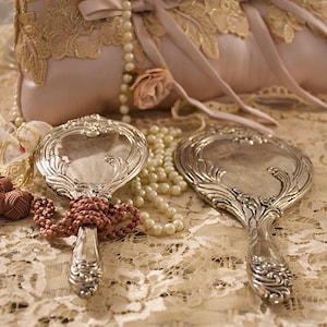 Elegant Antique Silver Mirror and Brush Dressing Table Set from the Early 1900s