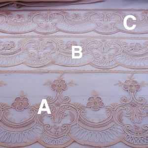 Merletto rebrodé avorio e rosa  “Maria Regina”