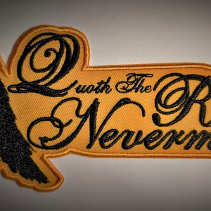 May include: A black embroidered patch with a raven and the text "Quoth the Raven Nevermore".
