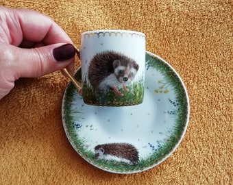 Hand painted porcelain espresso cup and saucer Hedgehogs decorated with gold by artist Lana Arkhi RMS