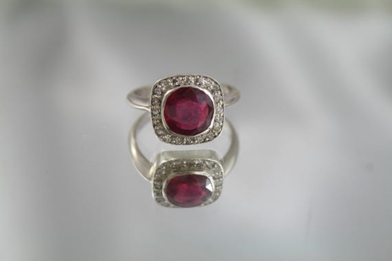 Art Deco Ruby Diamond Halo Ring: 18kt White Gold, Size 7.75