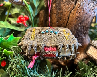 Adorno de libro de monstruos