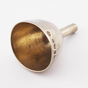A vintage silver plated Perfume Funnel