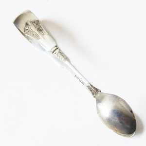 A pair of well decorated vintage Silver Plated Sugar Tongs