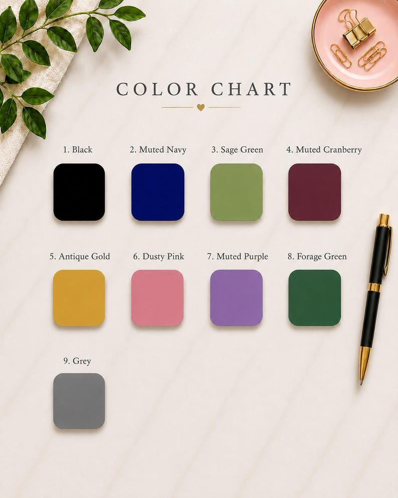 a color chart with various shades of black, blue, green, burgundy, purple, pink, grey, and green. The chart is accompanied by a pen and a plant, and the text "COLOR CHART" is visible.