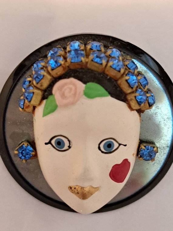 ATP Bejeweled face broach