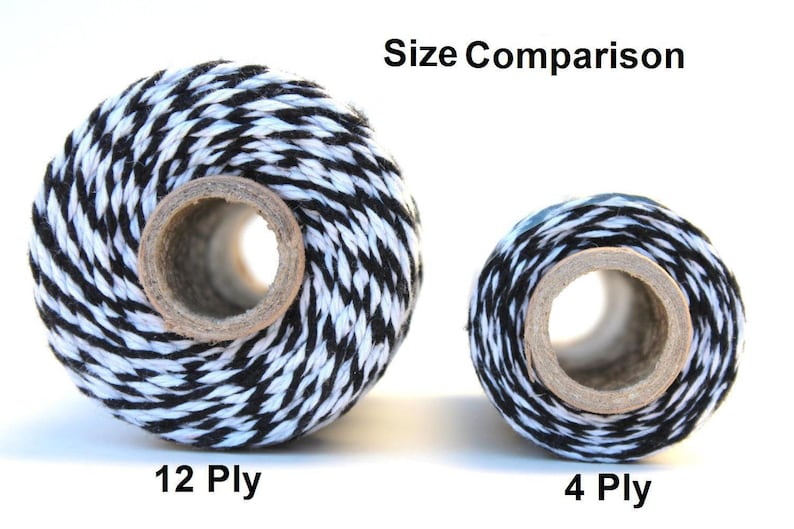 May include: Size comparison of two spools of black and white baker's twine. The larger spool is labeled "12 Ply" and the smaller spool is labeled "4 Ply".