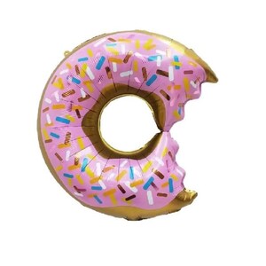 May include: A pink donut-shaped balloon with a bite taken out. The balloon has a gold-colored inner ring and is decorated with colorful sprinkles. This festive balloon is perfect for a birthday party or celebration.