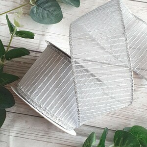 Silver wired striped christmas ribbon. Xmas tree, sheer, sparkly, glitter, garland