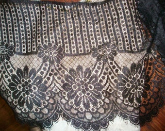 1920s or 30s black 0r cream lace with lovely floral/deco design