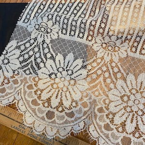 1920s or 30s black 0r white cream lace with lovely floral/deco design