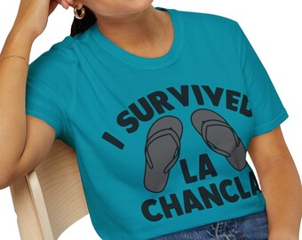 I Survived La Chancla Softstyle T-Shirt, Mother's Day Shirt, La Chancla humorous tee, shirt for mother, grandmother, great-grandmother.