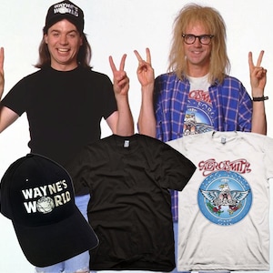 May include: Two men wearing black and white t-shirts with the text "Wayne's World" and "Aerosmith" on them. The man on the left is wearing a black baseball cap with the text "Wayne's World" on it. The man on the right is wearing a plaid shirt and glasses.