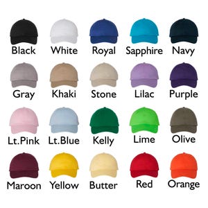 May include: A grid of twenty baseball caps in various solid colors, each labeled with its corresponding color name: Black, White, Royal, Sapphire, Navy, Gray, Khaki, Stone, Lilac, Purple, Lt. Pink, Lt. Blue, Kelly, Lime, Olive, Maroon, Yellow, Butter, Red, Orange.
