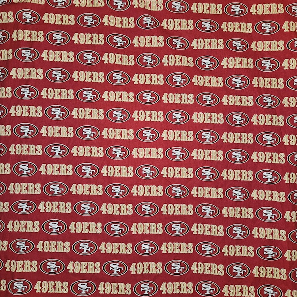 Tela de algodón con estampado disperso de los San Francisco 49ers Forty-Niners de 56 pulgadas
