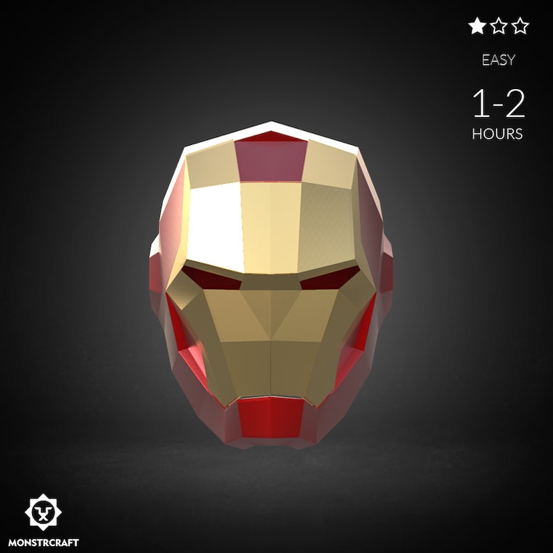 May include: A red and gold papercraft model of Iron Man's helmet. The model is made of folded paper and has a 3D effect. The helmet is a popular character from the Marvel comics and movies.