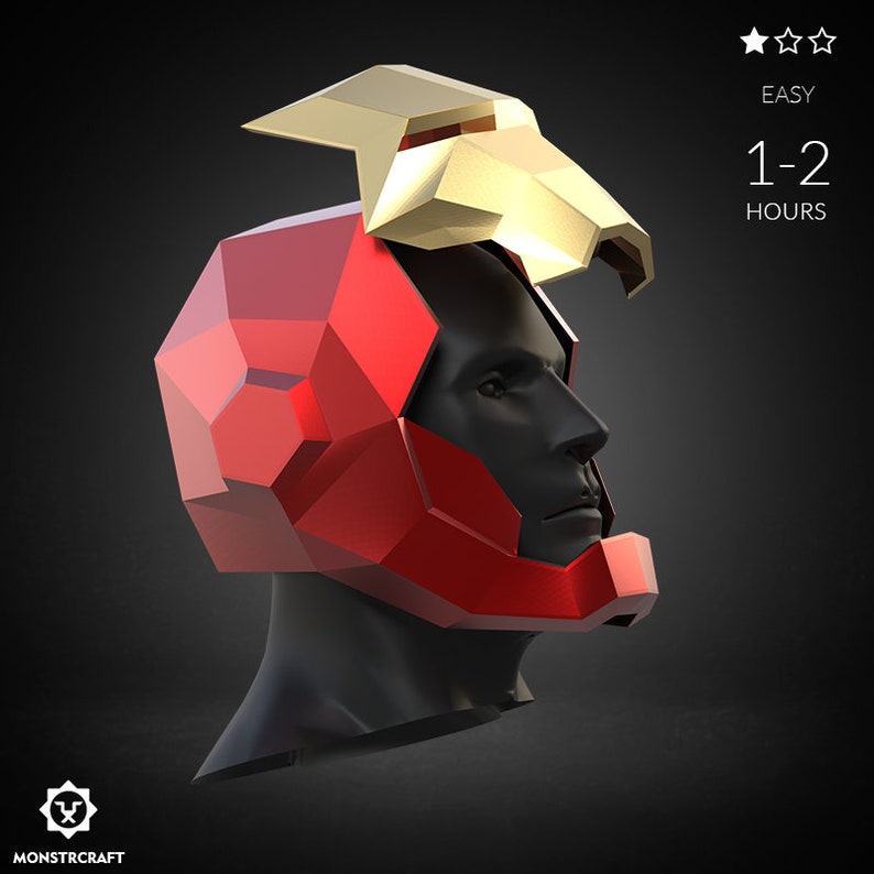 May include: A red and gold 3D printed helmet with a geometric design. The helmet is designed to look like Iron Man's helmet. The helmet is easy to assemble and takes 1-2 hours to complete.