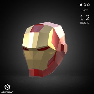 May include: A red and gold papercraft model of Iron Man's helmet. The helmet is made of many small, folded pieces of paper. It is a 3D model of the iconic superhero's head.