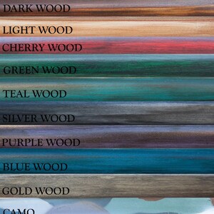 May include: A wood sample board with 10 different wood finishes, including dark wood, light wood, cherry wood, green wood, teal wood, silver wood, purple wood, blue wood, gold wood, and camo.
