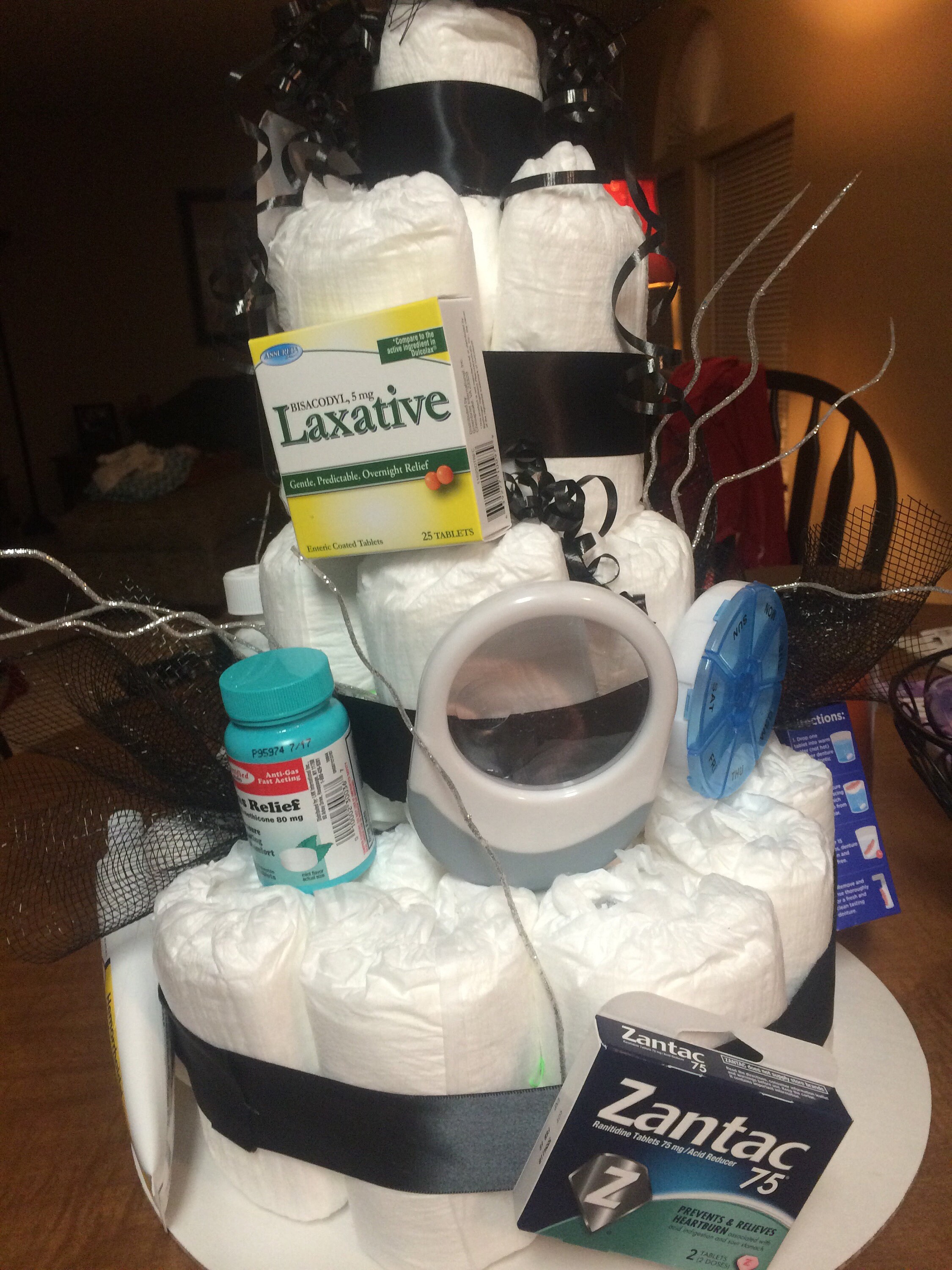 Over the Hill depend/diaper cake Etsy