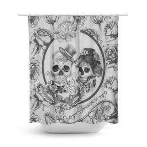 May include: Black and white shower curtain with a skull couple design. The skulls are wearing hats and have flowers in their hair. The text "Forevermore..." is written on the curtain.