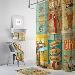 May include: A colorful shower curtain with a surf theme. The curtain features a woodgrain background with various surf-related graphics, including surfboards, a surfboard shop, and signs that say "Surf Zone", "Surf Point", and "Surf Equipment".