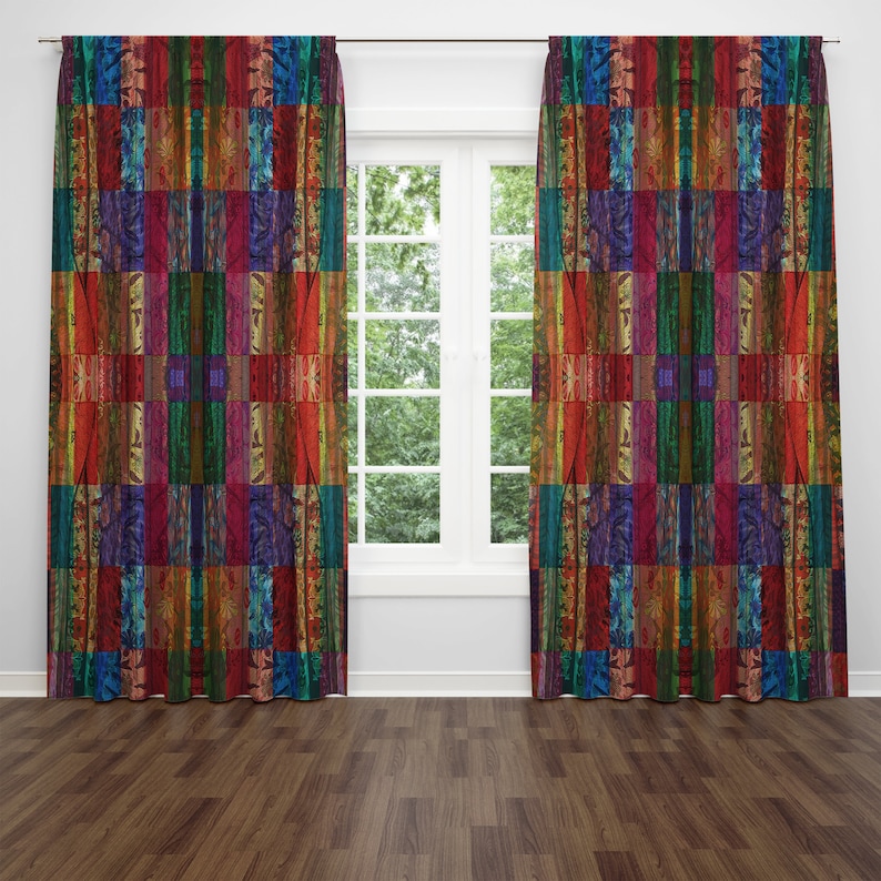May include: A pair of colorful curtains with a geometric pattern of squares and rectangles in shades of red, orange, yellow, green, blue, and purple. The curtains are hung on a white window frame.