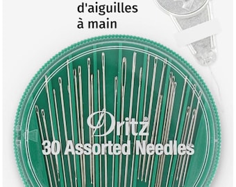 May include: A package of Dritz brand hand needles. The package is white and green, with the Dritz logo and text reading "30 Assorted Needles." The package contains 30 needles. The package also has the text "Hand Needle Assortment" in English and French.