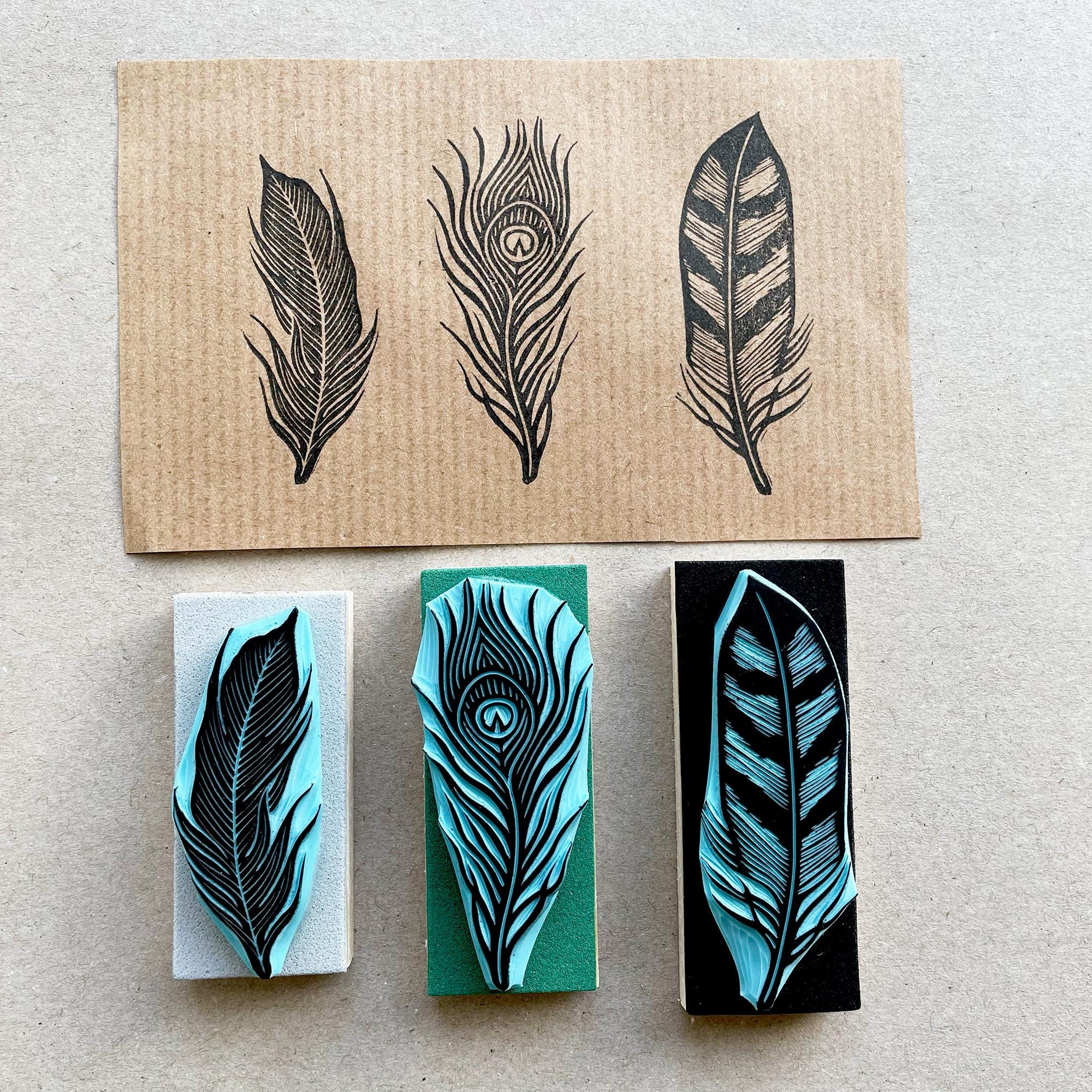Feather rubber stamps of a bird, peacock and owl