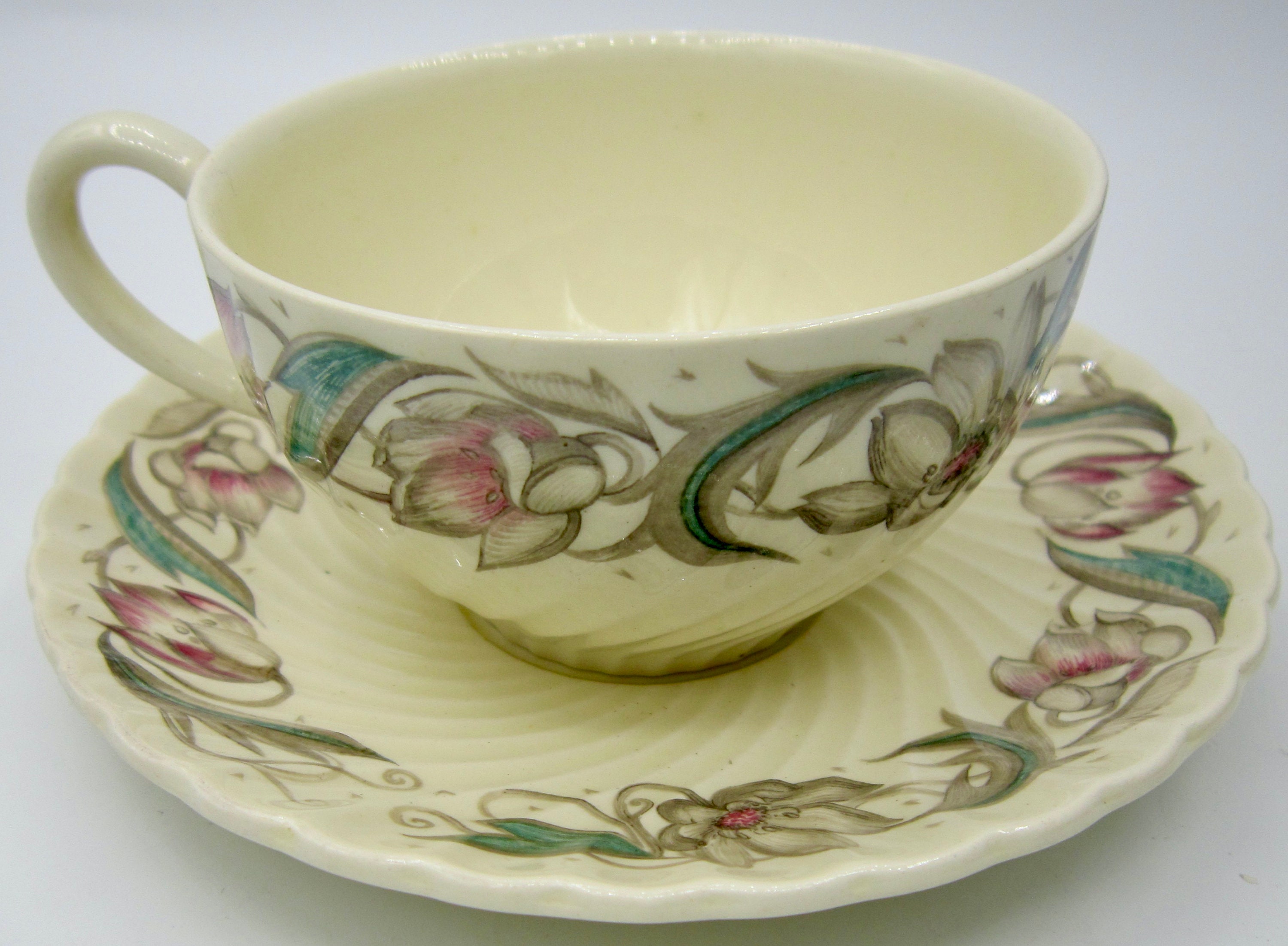 スージークーパー スカロップボーダーフローラルモチーフ