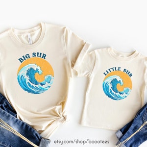 A daddy and me shirt featuring a wave that says Big Sur and Little Sur.