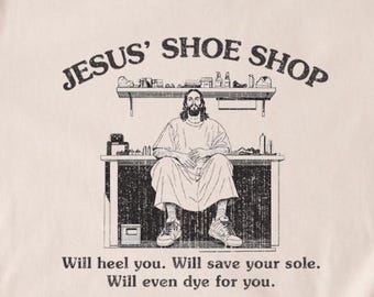 Camiseta de la zapatería de Jesús: Divertida camiseta cristiana de Pascua