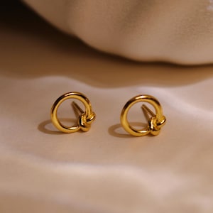 Elegant gold circle stud earrings * Geometric stud earrings * Minimalist gold stud earrings * Knot stud earrings * Gold circle stud earrings