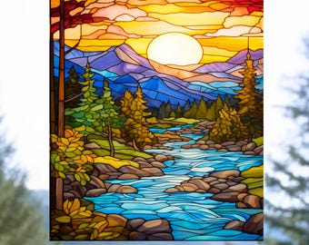 May include: A stained glass panel depicting a landscape with a flowing blue river, rocky banks, and green pine trees. In the background, purple mountains rise beneath a vibrant sunset sky featuring a large, bright yellow sun and orange clouds.