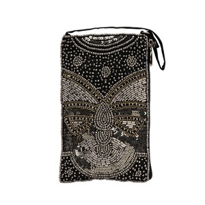 May include: Black rectangular clutch with intricate bead and sequin embellishments. The design features a central butterfly motif in silver and gold, surrounded by detailed patterns. The clutch has a black strap.