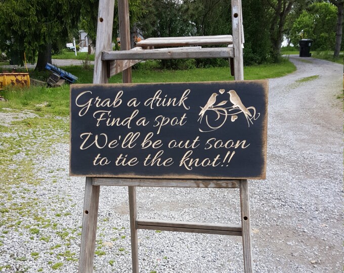 Custom Carved Wooden Sign - "Grab a Drink, Find a Spot, We'll Be Out Soon To Tie The Knot"