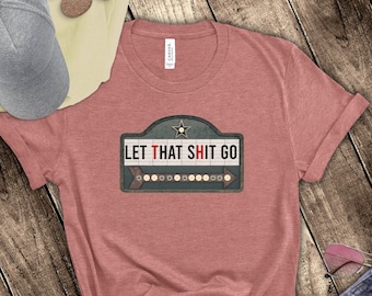 Zen Shirt/ Marquee Lights Cinema Sign Funny Let That Shit Go T-Shirt