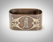 Heintz sterling on bronze napkin ring Arts Crafts B