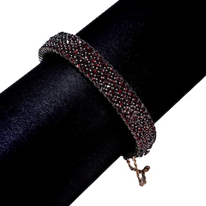 Victorian garnet bangle bracelet covered in stones