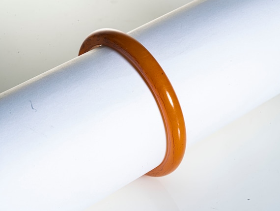 orange bakelite  bangle bracelet - image 1