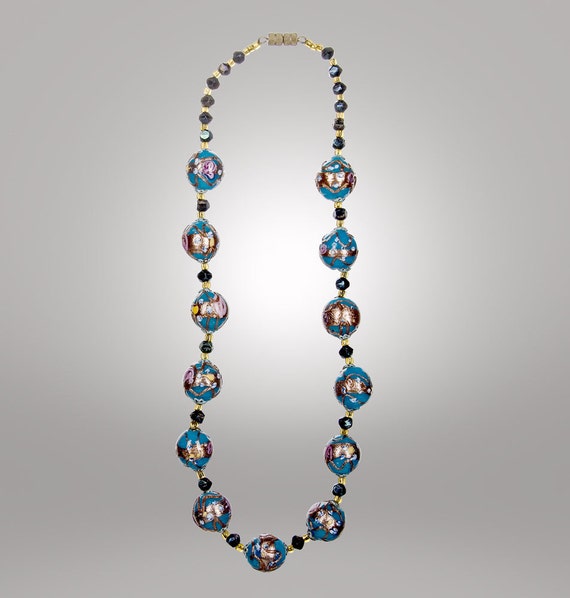 beaded necklace with fancy blue inlaid with goldst